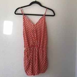 A romper orange and white